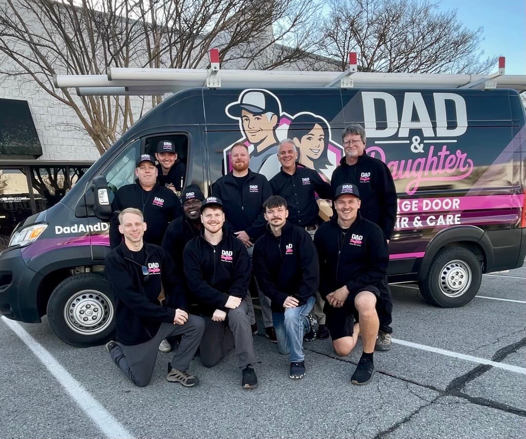 Full Dad & Daughter team in front of branded service van